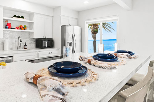 Coastal Lux kitchen | Cardo Vacation Rentals